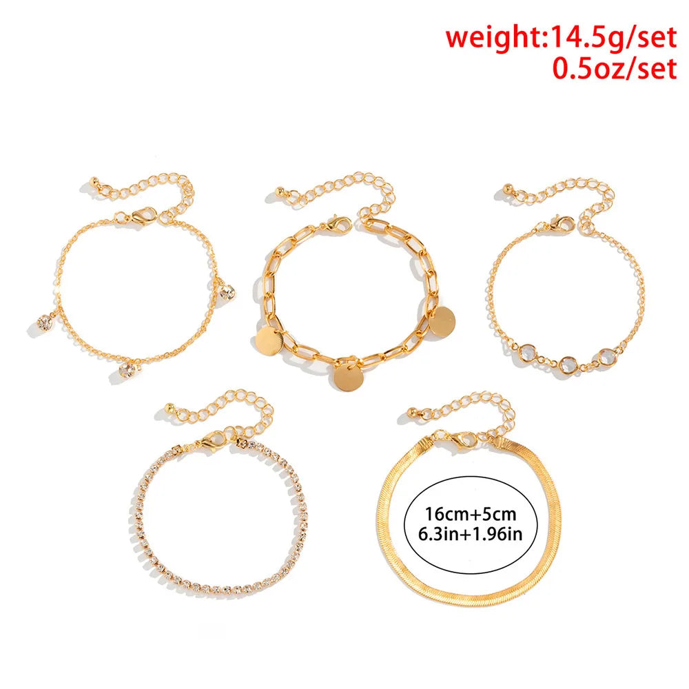 طقم أساور بتصميم بوهيمي أنيق، مزين بسلسلة على شكل عظمة ثعبان وقلادة مرصعة بأحجار الراين والترتر، بتصميم هندسي عصري، مناسب للفتيات.