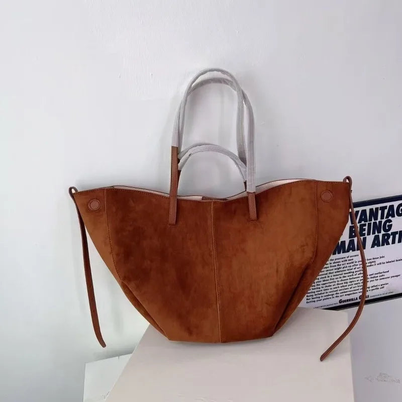 حقيبة يد كبيرة الحجم من الجلد الصناعي الناعم بلون موحد للنساء، بتصميم بسيط وسعة كبيرة، مناسبة للتسوق اليومي والتنقل