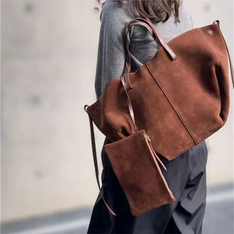 حقيبة يد كبيرة الحجم من الجلد الصناعي الناعم بلون موحد للنساء، بتصميم بسيط وسعة كبيرة، مناسبة للتسوق اليومي والتنقل