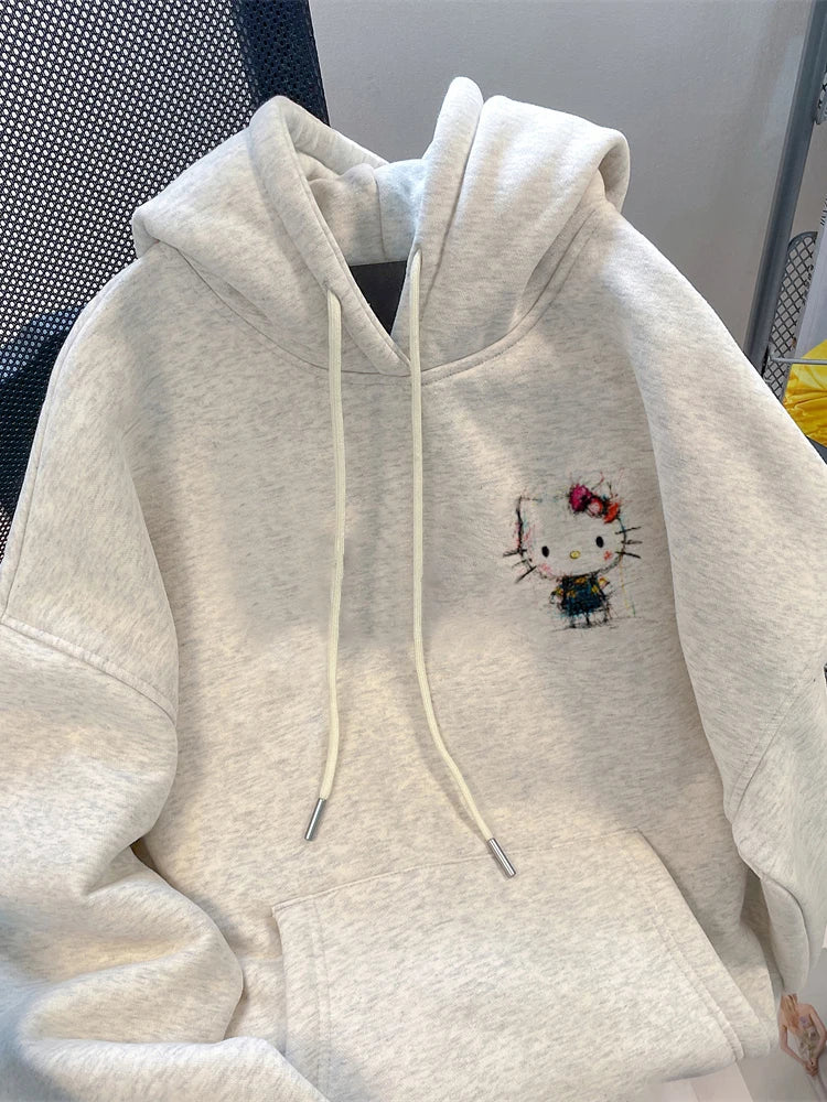 هودي قطة لطيفة ومريحة على الطراز الكوري للنساء في خريف 2025، بلوزة بقلنسوة شائعة للغاية وتقلل من العمر