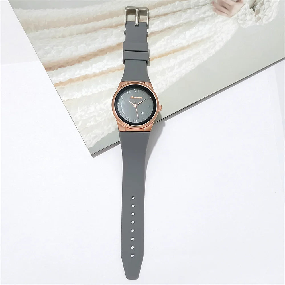 ساعة يد نسائية أنيقة وبسيطة بأرقام رومانية وتقويم، رياضية، كوارتز، مصنوعة من السيليكون، بإبزيم دبوس.