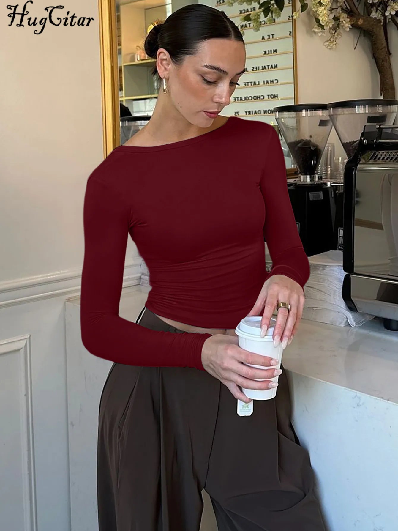 تيشيرت نسائي أنيق من Hugcitar، بياقة دائرية، بدون ظهر، بأكمام طويلة، بتصميم قصير وقصة ضيقة، مثالي لإطلالة خريفية أنيقة وعصرية، مناسبة للحفلات والمهرجانات والنوادي.