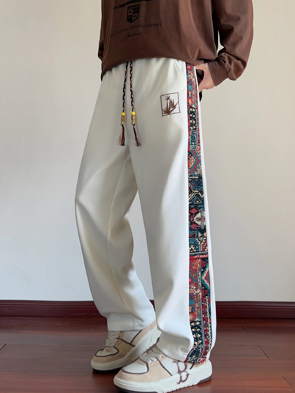 Men's spring and autumn casual pants, with ethnic style splicing design, suitable for outdoor leisure in spring and autumn