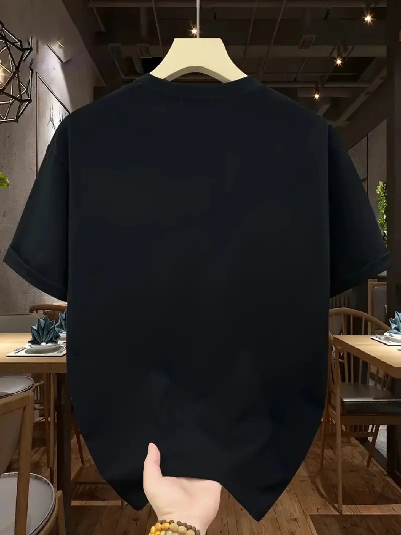 تيشيرت رجالي صيفي عصري مصنوع من القطن الخالص 100%، بتصميم فضفاض وطبعة كالفن، وياقة دائرية وأكمام قصيرة.