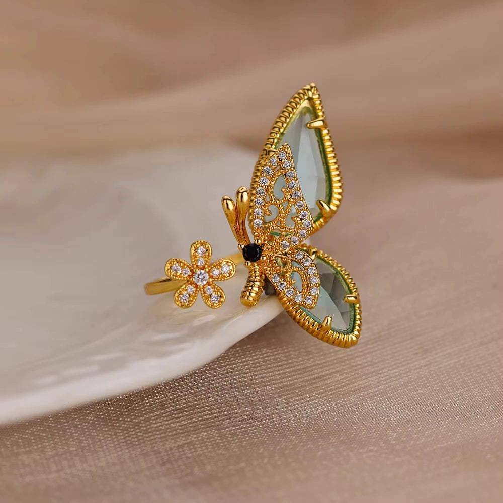 خواتم زركون زرقاء فاخرة للنساء، مصنوعة من الفولاذ المقاوم للصدأ ومطلية بالذهب، بتصميم زهرة وفراشة، مجوهرات براقة رائعة للحفلات 2025