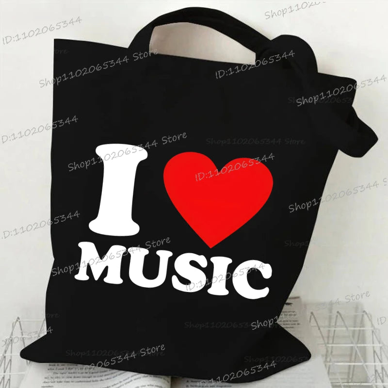 حقيبة يد كلاسيكية بطبعة نوتات موسيقية من الثمانينيات، وحقيبة قماشية مطبوعة بقلم رصاص، وحقيبة كتف لمحبي الموسيقى القديمة، وحقيبة مدرسية