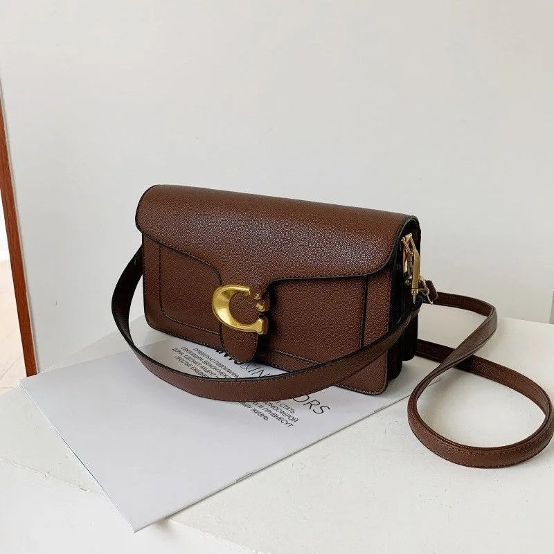 حقيبة نسائية للتنقلات المهنية، بتصميم كوري أنيق، وحقيبة صغيرة بتصميم غربي، وحقيبة ديونيسوس. حقائب