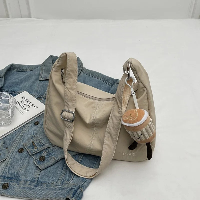 حقيبة كتف نسائية بتصميم بسيط وأنيق، حقيبة كروسبودي عصرية من النايلون، مناسبة للسفر، بسعة كبيرة.