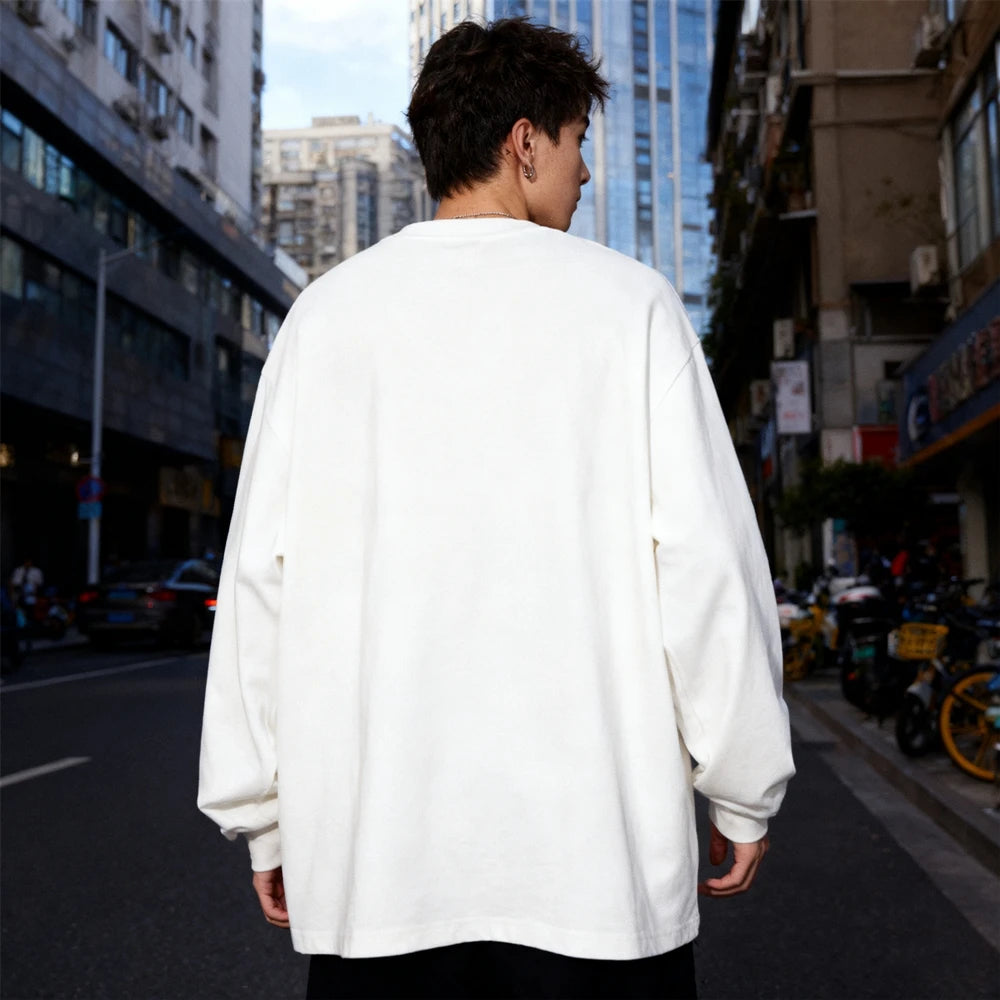 تي شيرت KUCLUT SAINT OF MICHAEL عصري مطبوع عليه رسومات غطاء زجاجة من KUCLUT SAINT OF MICHAEL بأكمام طويلة فضفاضة من القطن بنسبة 100% للرجال والنساء