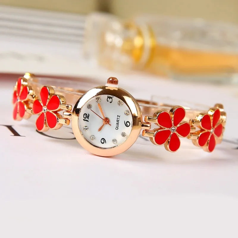 ساعة كوارتز نسائية أنيقة: تصميم أنيق باللونين الأسود والوردي بنقوش زهرية - فكرة هدية مثالية لأي مناسبة