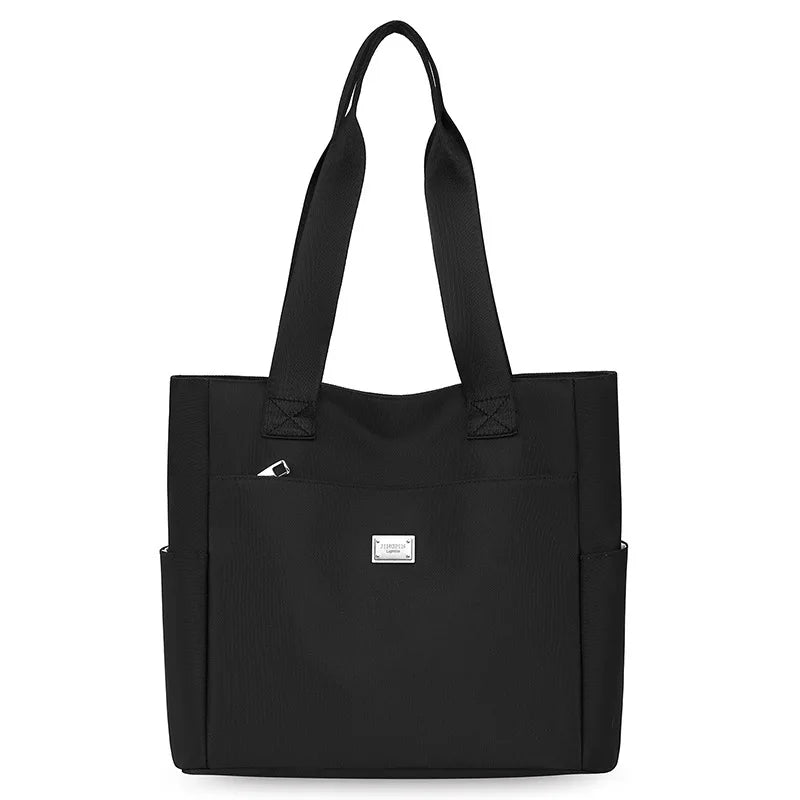 حقيبة حمل نسائية بسيطة 2025 حقيبة أم جديدة كبيرة السعة من النايلون حقيبة يد أنيقة بلون واحد حقيبة كتف واحدة حقائب يد نسائية