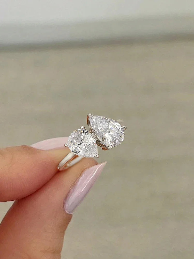 خواتم فضية عيار 925 بتصميم قطرات الماء المتلألئة المتشابكة مع أحجار الكمثرى الشفافة البراقة، هدية مثالية للنساء، مجوهرات فاخرة لحفلات الزفاف