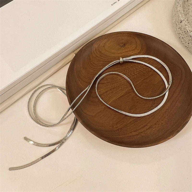 قلادة تشوكر أنيقة وعصرية جديدة مصنوعة من الفولاذ المقاوم للصدأ 316L، بطول 134 سم، مزودة بسلسلة ثعبان مسطحة قابلة للتعديل، مناسبة للنساء.