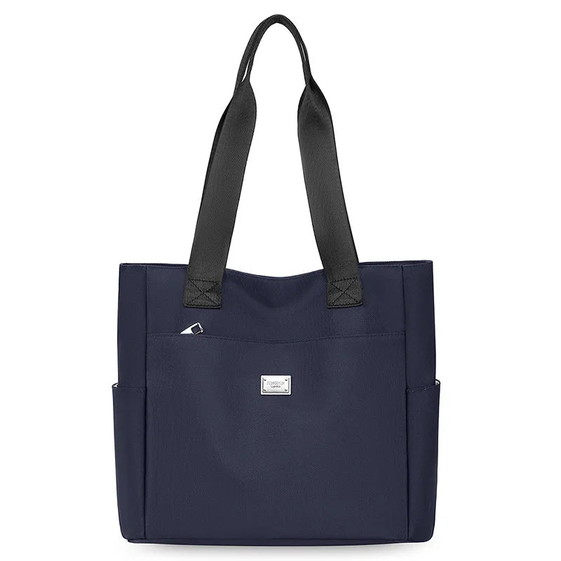 حقيبة حمل نسائية بسيطة 2025 حقيبة أم جديدة كبيرة السعة من النايلون حقيبة يد أنيقة بلون واحد حقيبة كتف واحدة حقائب يد نسائية