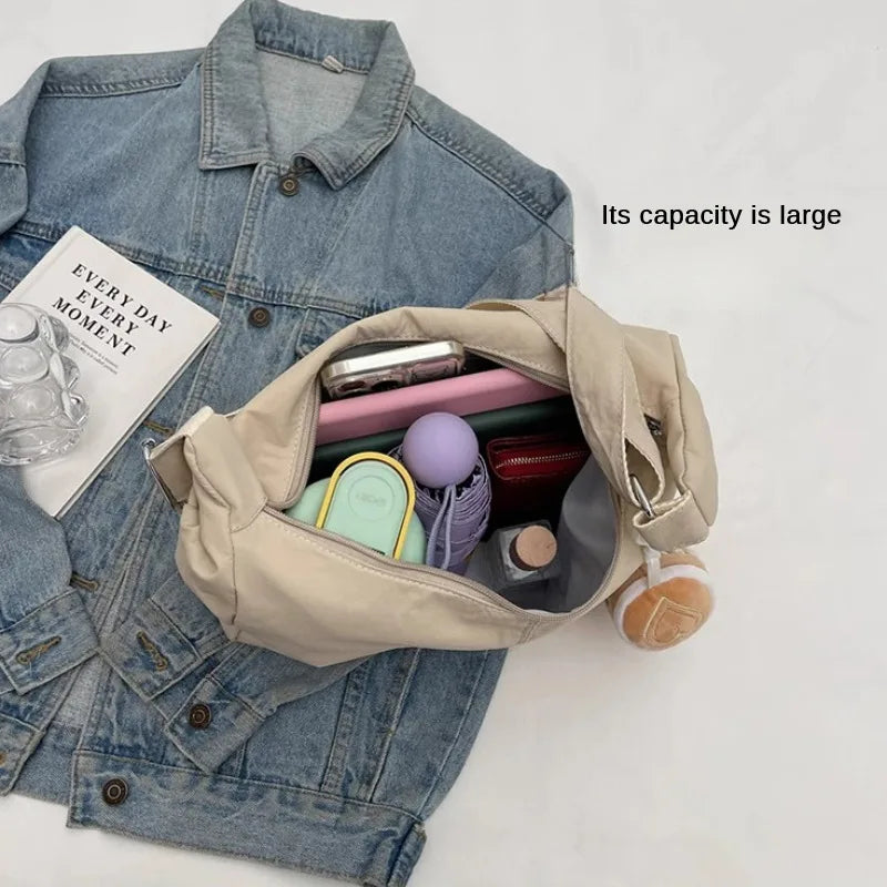 حقيبة كتف نسائية بتصميم بسيط وأنيق، حقيبة كروسبودي عصرية من النايلون، مناسبة للسفر، بسعة كبيرة.