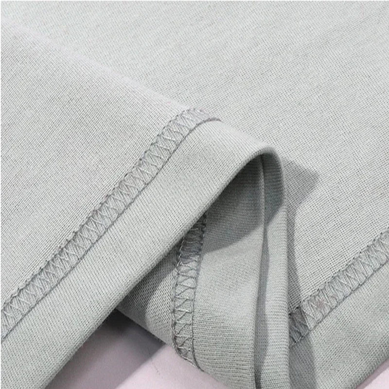 تيشيرت رياضي جديد عالي الجودة لعام 2025، فضفاض وواسع، مصنوع من القطن، بأكمام قصيرة، مناسب للرجال، مثالي للتدريب الصيفي والجري.