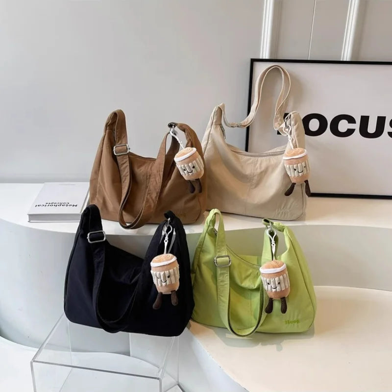 حقيبة كتف نسائية بتصميم بسيط وأنيق، حقيبة كروسبودي عصرية من النايلون، مناسبة للسفر، بسعة كبيرة.