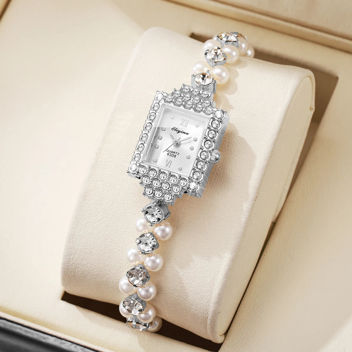 طقم ساعة يد نسائية أنيقة مكون من نصف ساعة، مرصعة بأحجار الراين، ذات مينا مستطيل، وسوار من اللؤلؤ (بدون علبة).