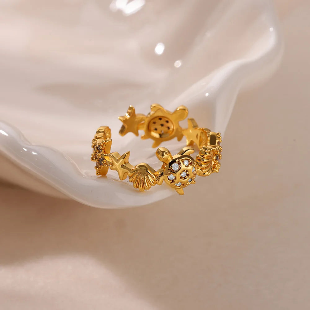خواتم مفتوحة على شكل صدفة نجم البحر للنساء، لون ذهبي، مصنوعة من الفولاذ المقاوم للصدأ، مناسبة لفصل الصيف، مثالية للشاطئ، مقاومة للماء، هدية مثالية.