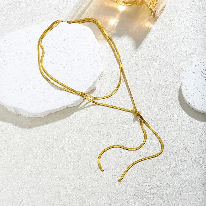 قلادة تشوكر أنيقة وعصرية جديدة مصنوعة من الفولاذ المقاوم للصدأ 316L، بطول 134 سم، مزودة بسلسلة ثعبان مسطحة قابلة للتعديل، مناسبة للنساء.