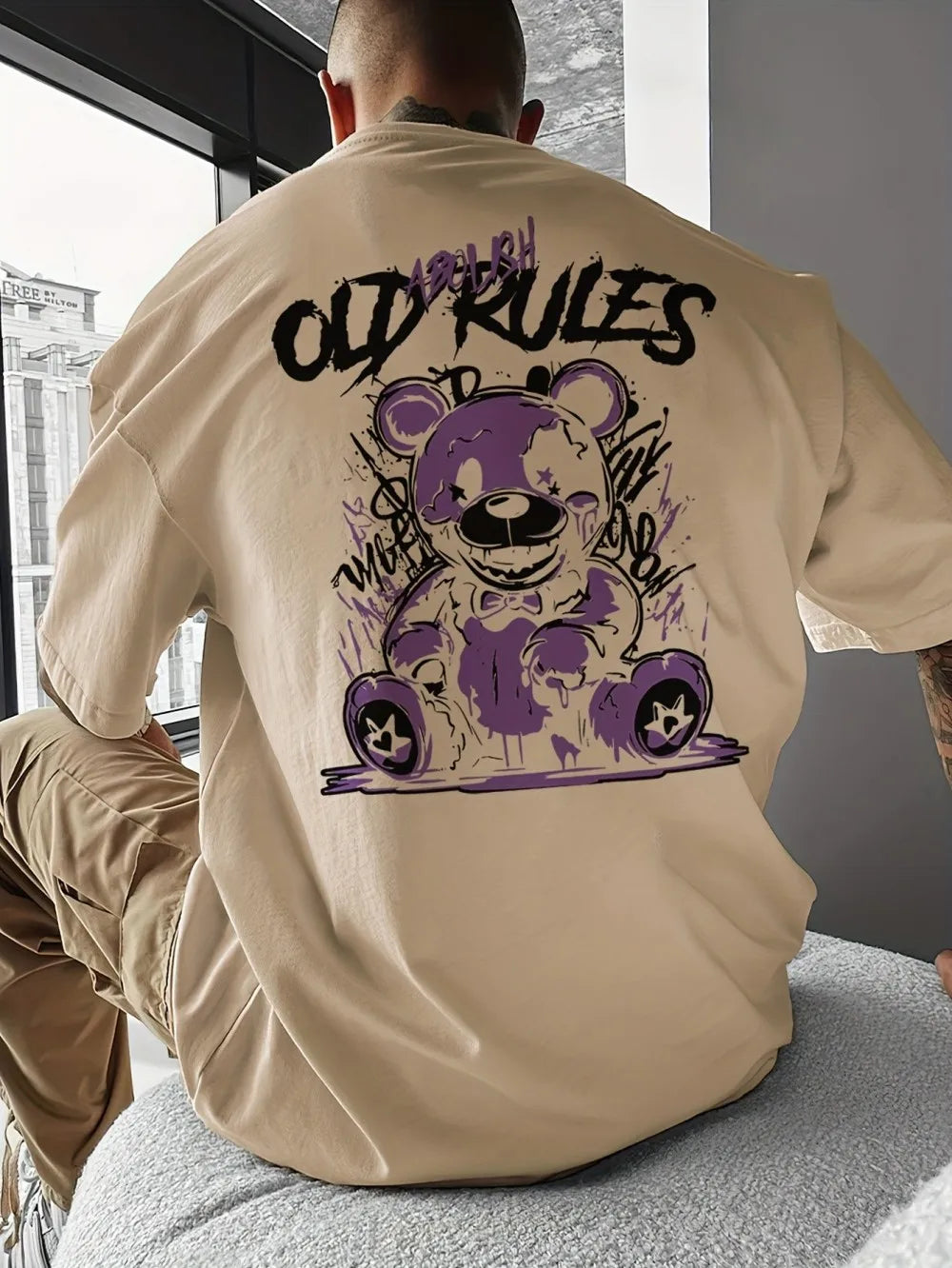 تيشيرت رجالي صيفي جديد رائج للغاية، مطبوع عليه حروف على شكل دب تيدي، مريح وجيد التهوية، برقبة دائرية، مناسب للارتداء في الهواء الطلق، بتصميم عصري أنيق.