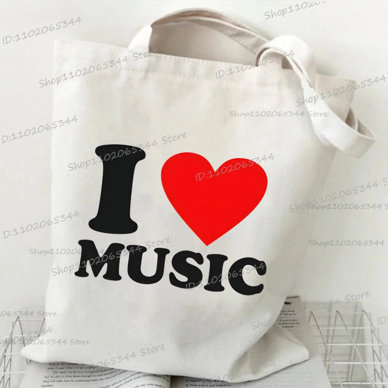 حقيبة يد كلاسيكية بطبعة نوتات موسيقية من الثمانينيات، وحقيبة قماشية مطبوعة بقلم رصاص، وحقيبة كتف لمحبي الموسيقى القديمة، وحقيبة مدرسية