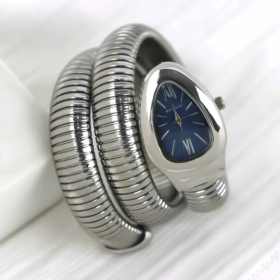 ساعات كوارتز فريدة من نوعها للنساء من الذهب الثعباني رائجة البيع ساعة بسيطة كلاسيكية الطراز للنساء ساعة فاخرة لامعة للسيدات ساعة Relogio