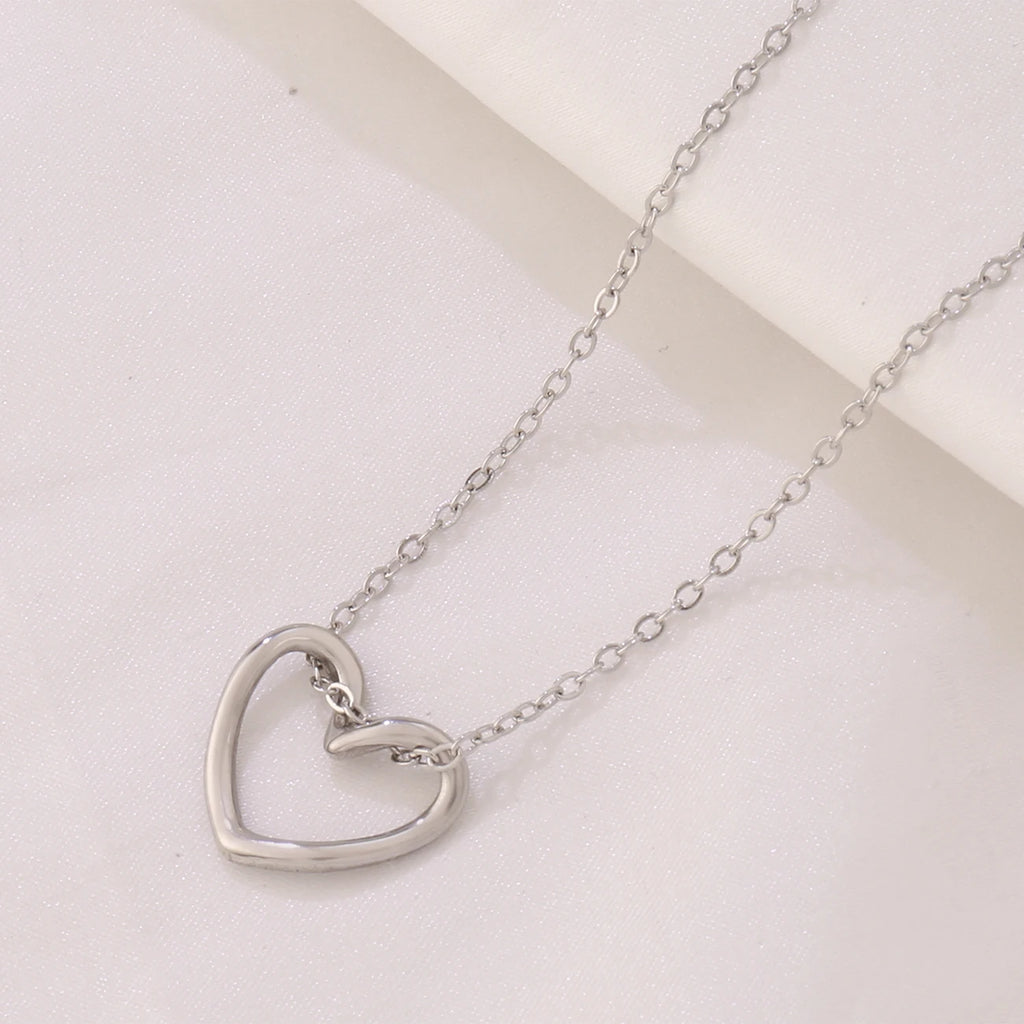 New Simple Stainless Steel Hollow Twist Love Heart Pendant Necklace for Women Girls Fashion Chain Necklaces Party Jewelry Gifts