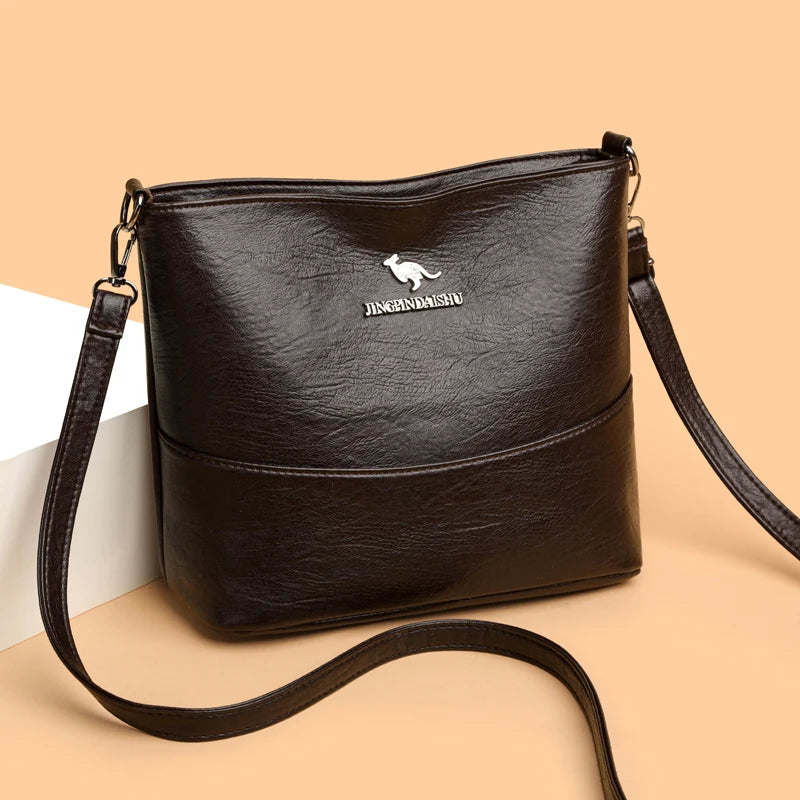 Spacious Chic Crossbody Bag for Women - Soft Faux Leather Shoulder Purse with Adjustable Strap, Zip Closure, Multiple Pockets.