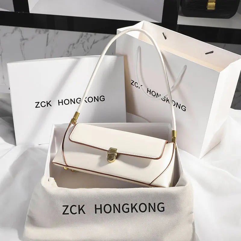 Armpit bag retro niche design high-end solid color one-shoulder portable genuine leather women's bag spring and summer versatile