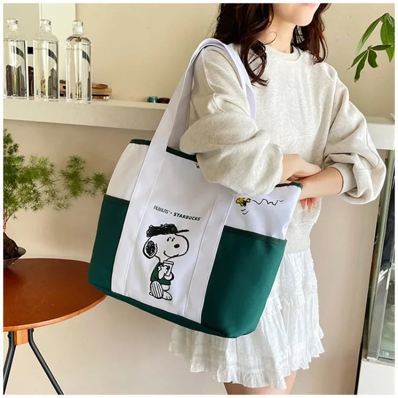 حقيبة قماشية كاجوال كبيرة الحجم مطبوعة عليها صورة سنوبي كرتونية جديدة من MINISO، حقيبة يد عصرية للطلاب بكتف واحد