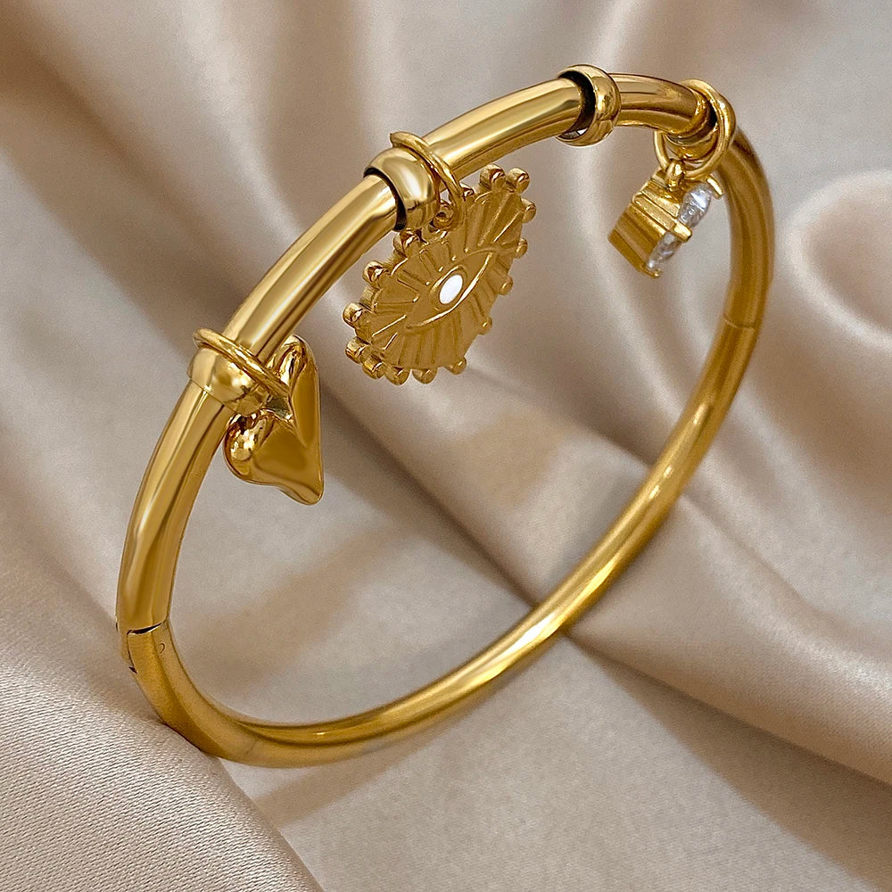 سوار أنيق من الفولاذ المقاوم للصدأ للنساء مطلي بالذهب على شكل قلب من الزركون وعين الشيطان مع أساور مجوهرات هدايا