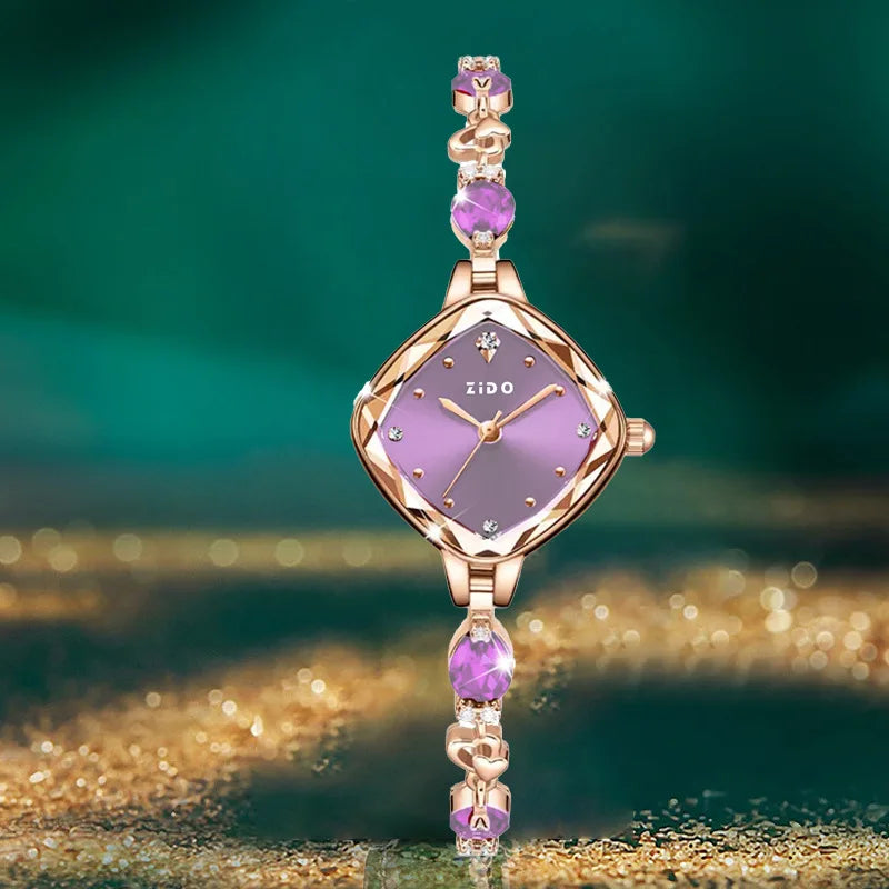 ساعة نسائية من ماركة UTHAI، لون أحمر، تصميم فاخر، سوار معدني مرصع بالكريستال والماس، مقاومة للماء، ساعة أنيقة وعصرية.