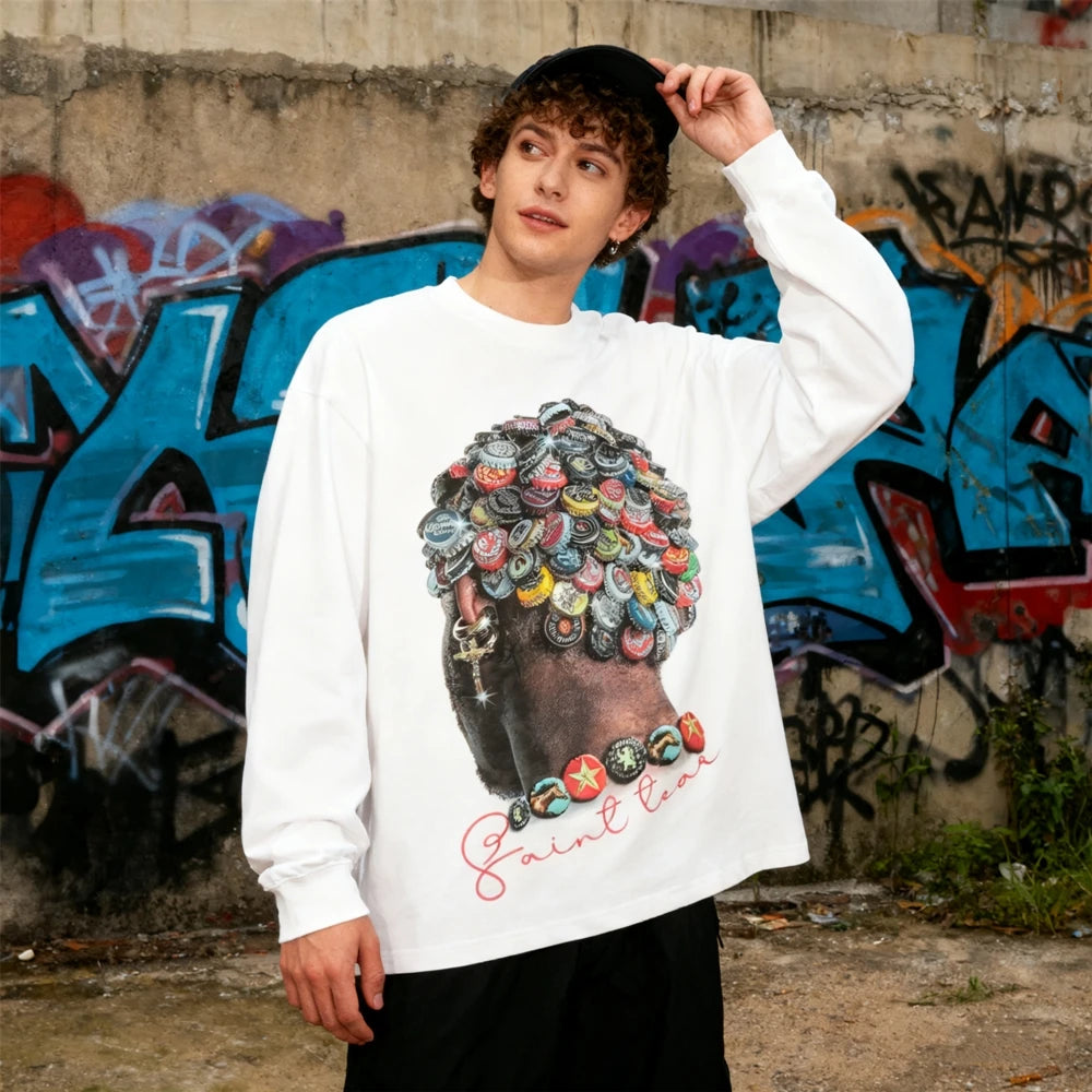 تي شيرت KUCLUT SAINT OF MICHAEL عصري مطبوع عليه رسومات غطاء زجاجة من KUCLUT SAINT OF MICHAEL بأكمام طويلة فضفاضة من القطن بنسبة 100% للرجال والنساء