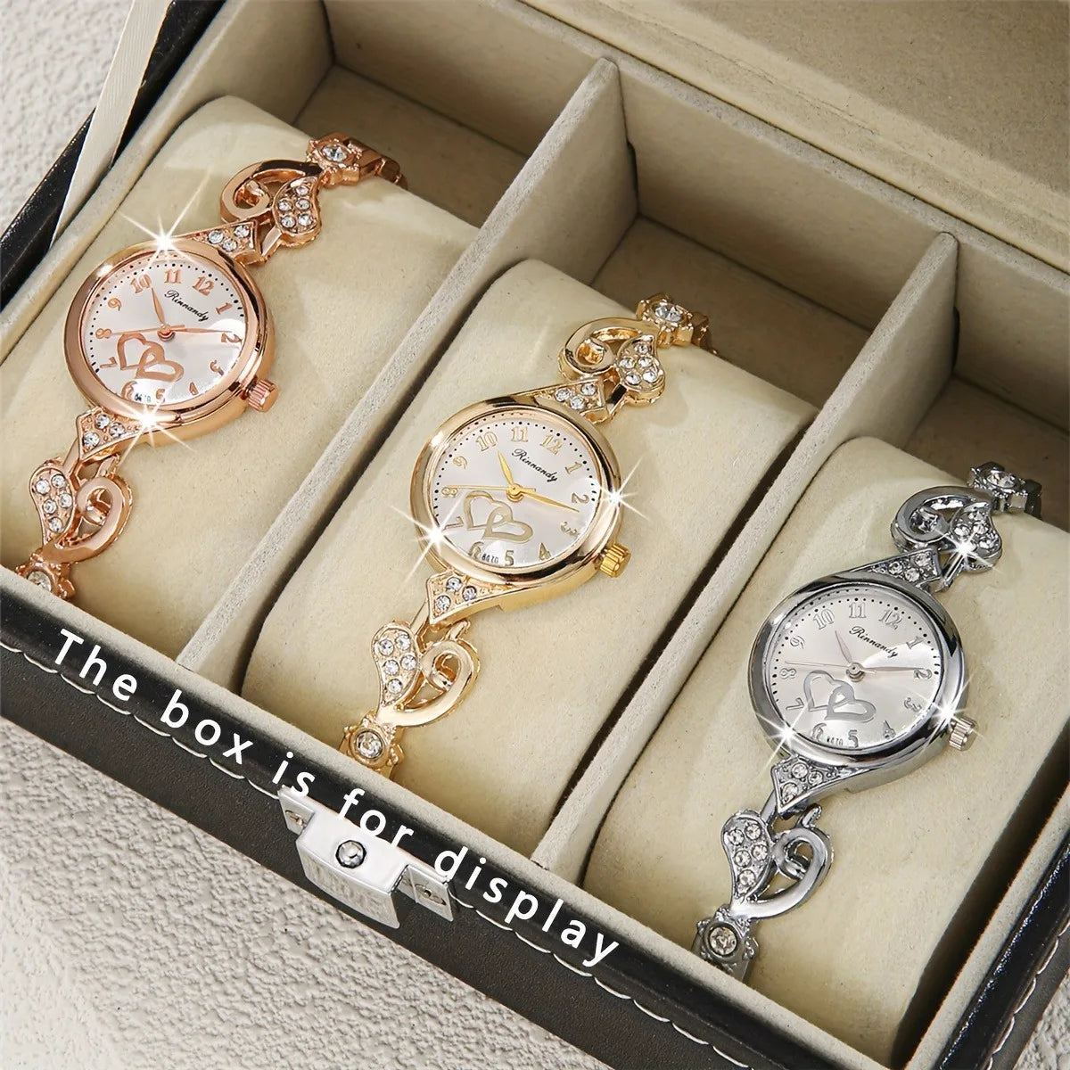 ساعة يد نسائية أنيقة من الكوارتز، مزينة بسوار مرصع بأحجار الراين على شكل قلوب (بدون علبة)