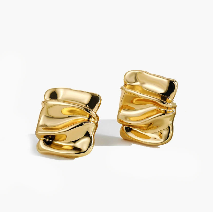 أقراط من الفولاذ المقاوم للصدأ مطلية بالذهب بتصميم عتيق للنساء، بتصميم دائري هندسي ملتف، قطعة مجوهرات أنيقة وعصرية.