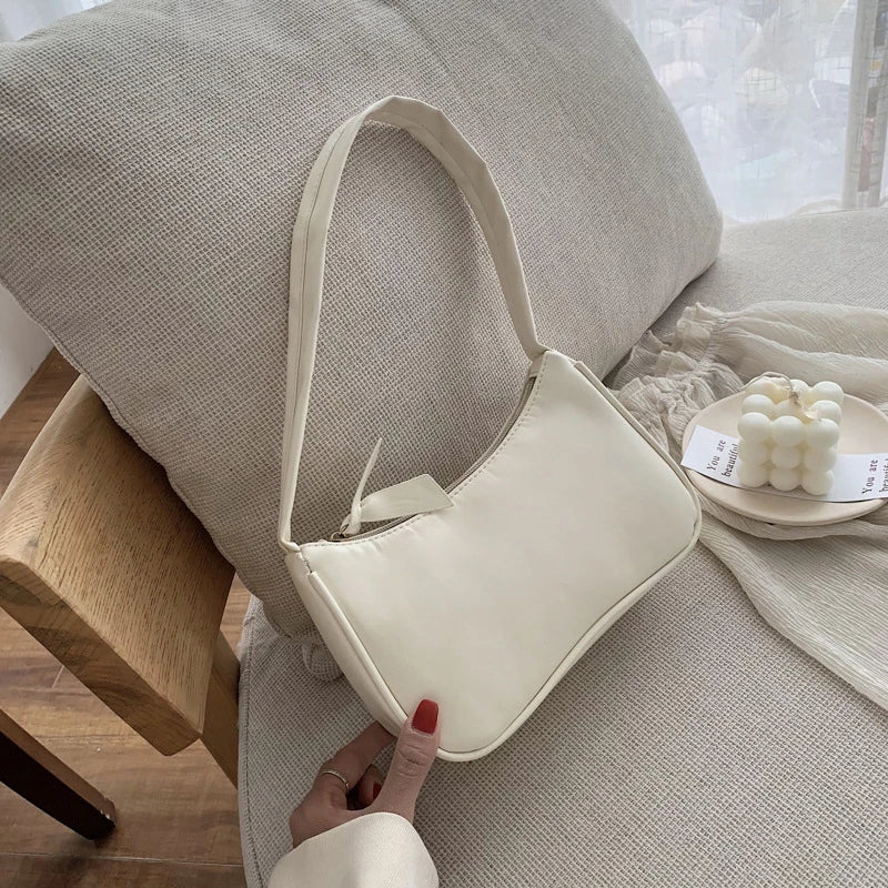 Retro forearm bag women's bow handbag PU leather bag Western style single shoulder minimalist