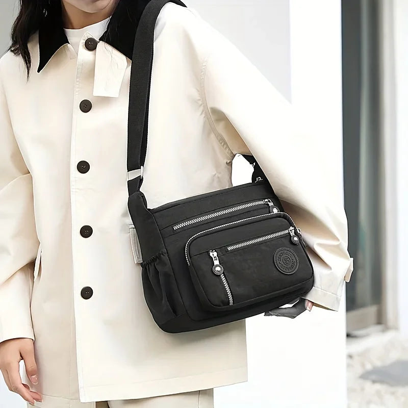 حقيبة كروس بودي من النايلون المقاوم للماء، جيوب متعددة وسحاب للإغلاق، حقيبة كتف أنيقة غير رسمية للسفر والاستخدام اليومي