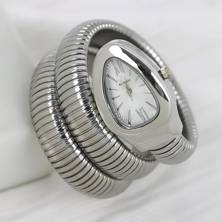 ساعات كوارتز فريدة من نوعها للنساء من الذهب الثعباني رائجة البيع ساعة بسيطة كلاسيكية الطراز للنساء ساعة فاخرة لامعة للسيدات ساعة Relogio