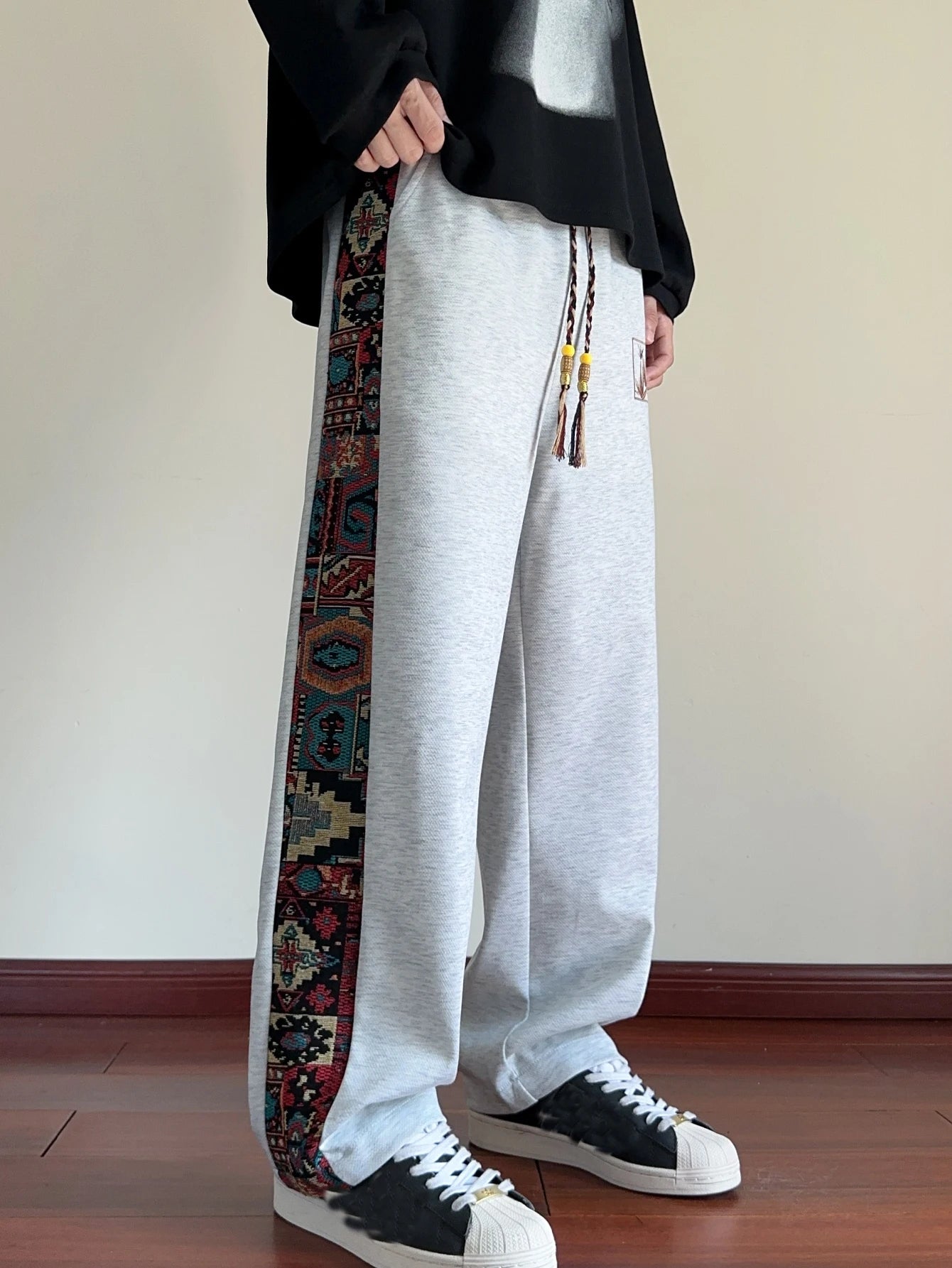 Men's spring and autumn casual pants, with ethnic style splicing design, suitable for outdoor leisure in spring and autumn