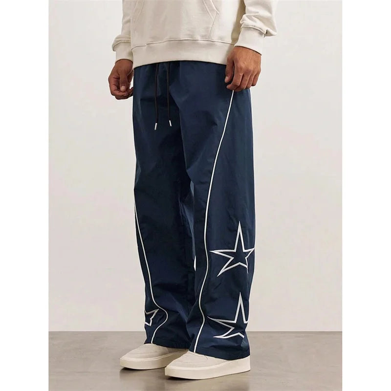 2025 Spring Autumn New Men’s pure color Casual Embroidered Drawstring Pants Men fashion Loose quick-drying Leg Straight Pants