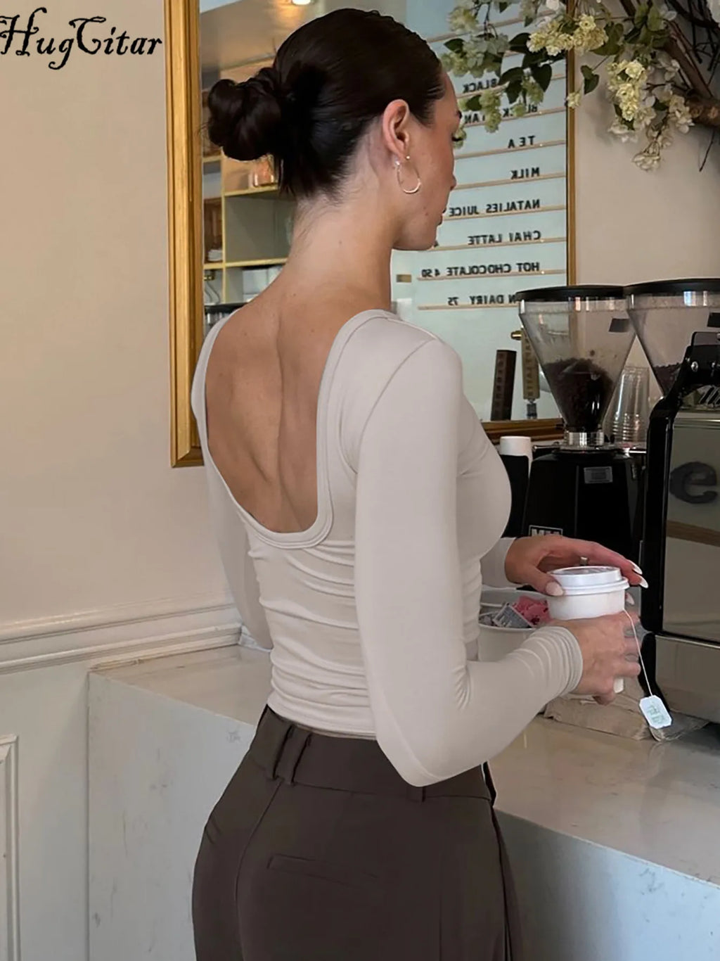 تيشيرت نسائي أنيق من Hugcitar، بياقة دائرية، بدون ظهر، بأكمام طويلة، بتصميم قصير وقصة ضيقة، مثالي لإطلالة خريفية أنيقة وعصرية، مناسبة للحفلات والمهرجانات والنوادي.