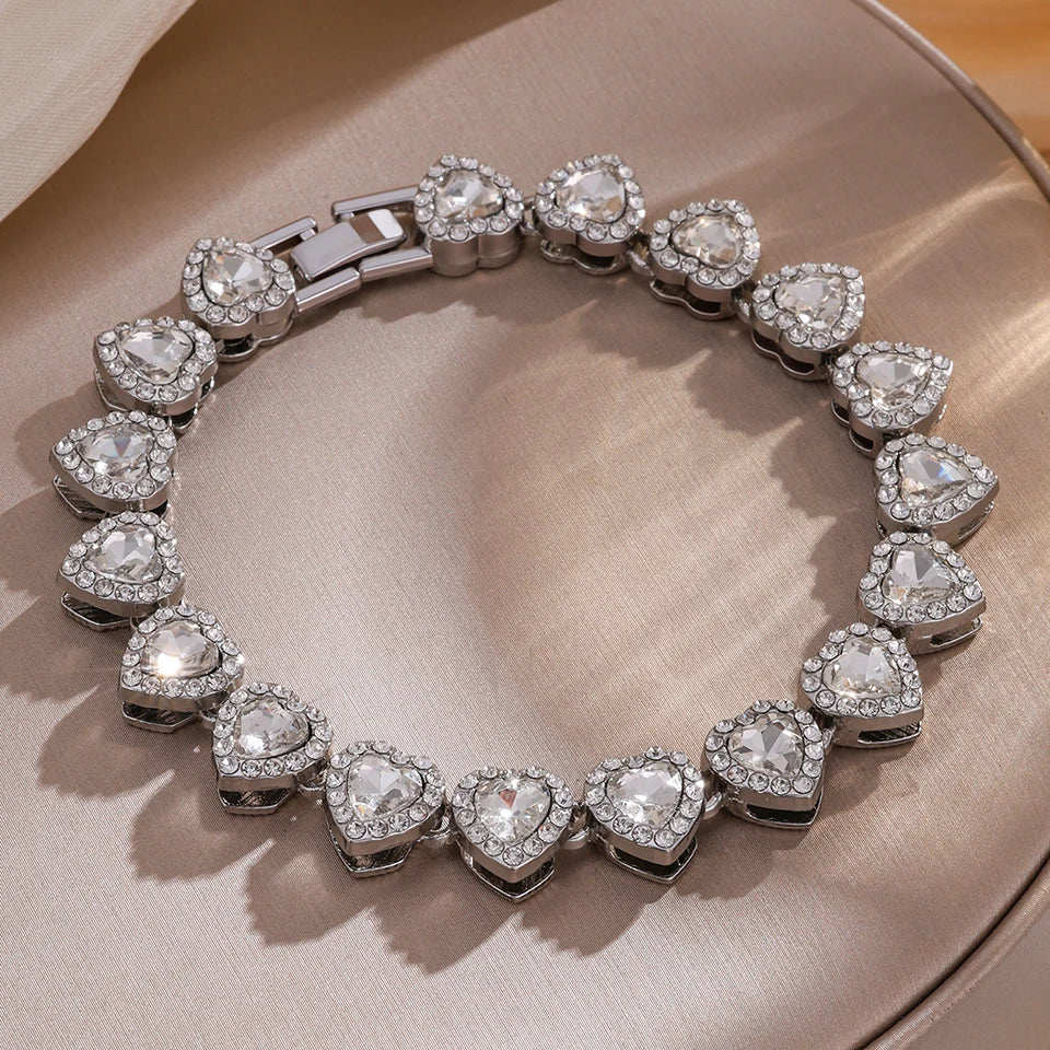 مجموعة زاكول من 3 قطع من الأساور اللامعة على شكل قلب مرصعة بأحجار الراين المصنوعة من الفولاذ المقاوم للصدأ، بتصميم عصري مستوحى من موسيقى الهيب هوب والروك، قابلة للتكديس.