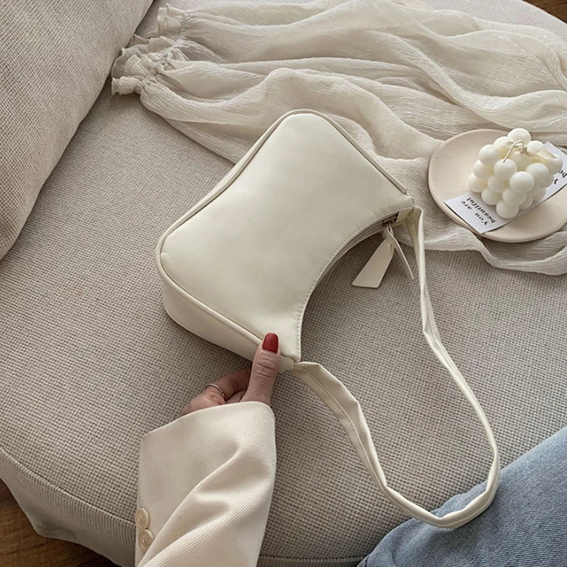 Retro forearm bag women's bow handbag PU leather bag Western style single shoulder minimalist