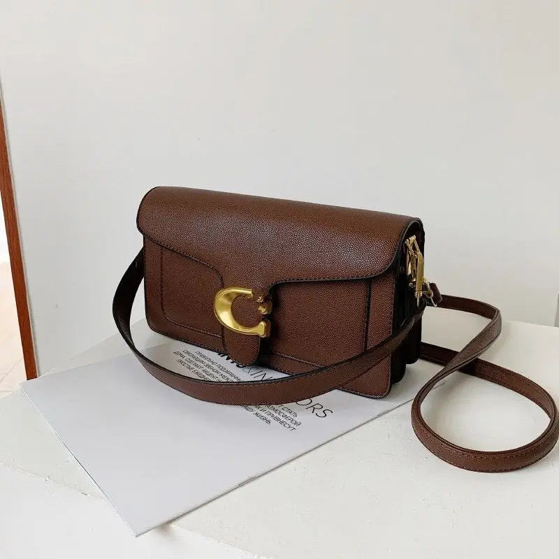 حقيبة نسائية للتنقلات المهنية، بتصميم كوري أنيق، وحقيبة صغيرة بتصميم غربي، وحقيبة ديونيسوس. حقائب