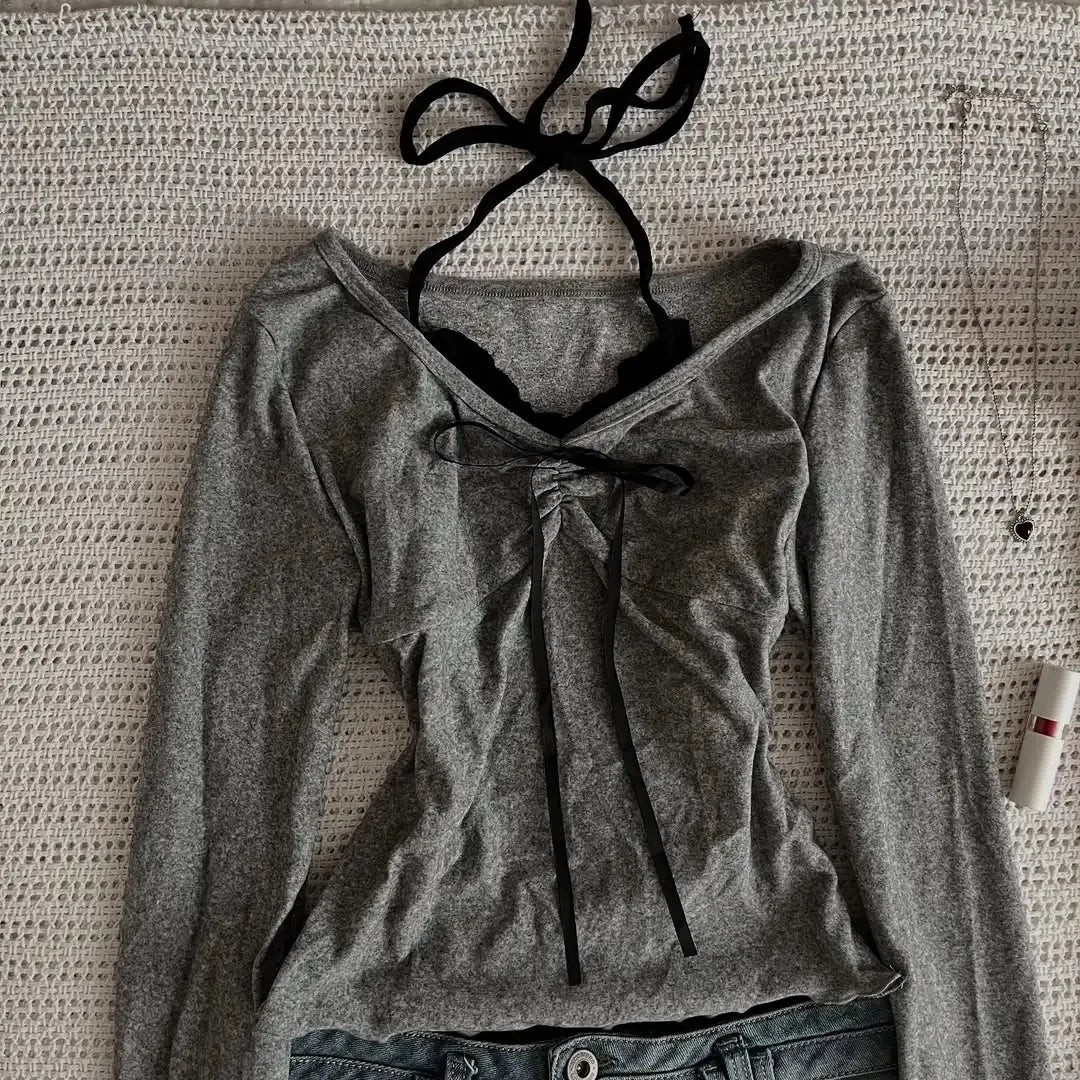 قمصان نسائية خريفية بياقة مدورة مع حواف من الدانتيل وقصة ضيقة وحاشية متعددة الطبقات وأكمام طويلة ونمط مقصوص