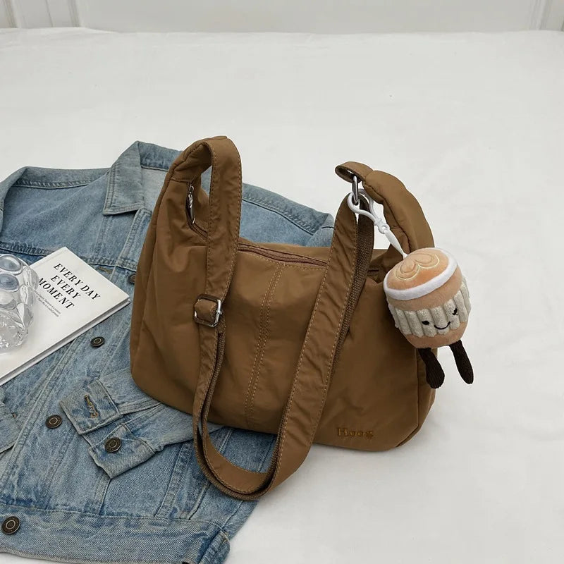 حقيبة كتف نسائية بتصميم بسيط وأنيق، حقيبة كروسبودي عصرية من النايلون، مناسبة للسفر، بسعة كبيرة.