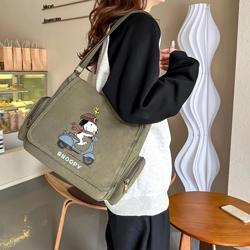 حقيبة سنوبي الجديدة المصنوعة من القماش متعددة الجيوب بطبعة كرتون سنوبي حقيبة كتف للنساء حقيبة كروس بودي كبيرة للجنسين حقيبة سفر