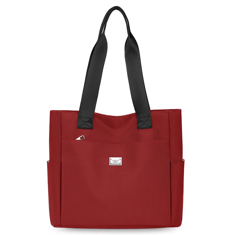 حقيبة حمل نسائية بسيطة 2025 حقيبة أم جديدة كبيرة السعة من النايلون حقيبة يد أنيقة بلون واحد حقيبة كتف واحدة حقائب يد نسائية