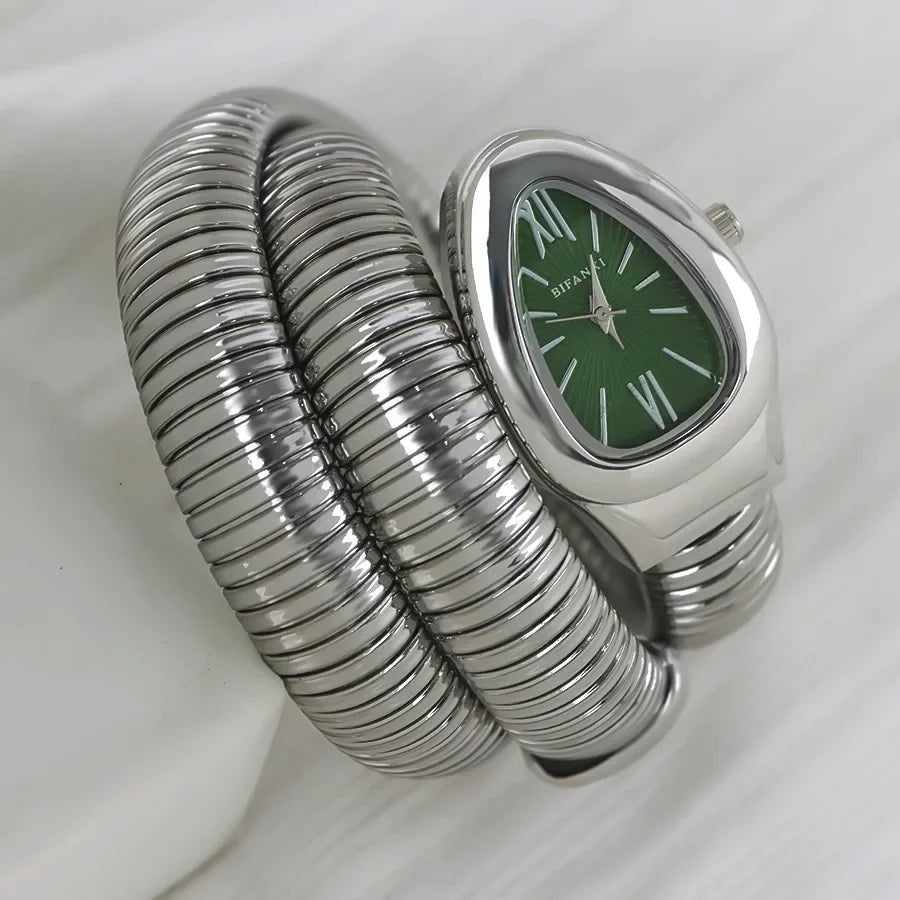 ساعات كوارتز فريدة من نوعها للنساء من الذهب الثعباني رائجة البيع ساعة بسيطة كلاسيكية الطراز للنساء ساعة فاخرة لامعة للسيدات ساعة Relogio